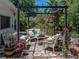 Relaxing backyard patio area, featuring comfortable seating and mature landscaping at 3001 9Th N Ave, St Petersburg, FL 33713