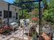 Relaxing backyard patio area, featuring comfortable seating and mature landscaping at 3001 9Th N Ave, St Petersburg, FL 33713