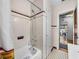 The bathroom features a shower with a chrome shower head and white tiled walls at 3001 9Th N Ave, St Petersburg, FL 33713