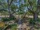 Landscaped front yard featuring mature trees that provide plenty of shade along the walkway up to the home at 3001 9Th N Ave, St Petersburg, FL 33713