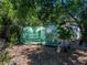 Backyard greenhouse offers a dedicated space for cultivating plants and flowers at 3001 9Th N Ave, St Petersburg, FL 33713