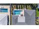 Aerial view of backyard pools, patio, and manicured lawn of this stunning home at 3112 65Th N Way, St Petersburg, FL 33710
