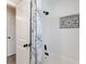 Bathroom features a shower/tub combo with decorative accent tile and a shower curtain at 3112 65Th N Way, St Petersburg, FL 33710