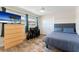 Comfortable bedroom with a TV, desk, closet space, and a serene atmosphere at 3112 65Th N Way, St Petersburg, FL 33710