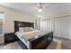 Bedroom features neutral walls and a large bed with white bedding and cozy blanket at 3112 65Th N Way, St Petersburg, FL 33710