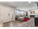 Spacious living room with ample natural light, wood floors, and neutral color palette at 3112 65Th N Way, St Petersburg, FL 33710