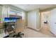 Bright office space with a large window and modern decor, perfect for a home workspace at 3112 65Th N Way, St Petersburg, FL 33710