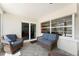 Cozy screened-in patio with comfortable seating, offering a relaxing outdoor space at 3112 65Th N Way, St Petersburg, FL 33710