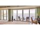 Inviting balcony with comfortable seating and panoramic lake views, perfect for outdoor relaxation at 3301 Bayshore Blvd # 2401E, Tampa, FL 33629