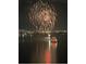 Fireworks at night over the water and a boat at 3301 Bayshore Blvd # 2401E, Tampa, FL 33629