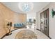 Inviting foyer with curved wall and unique chandelier, with a seating area and water views at 3301 Bayshore Blvd # 2401E, Tampa, FL 33629