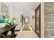 Elegant hallway features marble floors, decorative stone accent walls, and recessed lighting at 3301 Bayshore Blvd # 2401E, Tampa, FL 33629