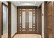 Modern hallway with detailed doors and neutral decor at 3301 Bayshore Blvd # 2401E, Tampa, FL 33629