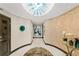 Stately hallway features a dramatic chandelier, curved walls and marble floors at 3301 Bayshore Blvd # 2401E, Tampa, FL 33629
