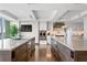 Modern kitchen featuring dual islands, stainless steel appliances, and sleek white cabinetry at 3301 Bayshore Blvd # 2401E, Tampa, FL 33629