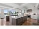 Modern kitchen features two center islands, stainless steel appliances, light countertops, and cityscape view at 3301 Bayshore Blvd # 2401E, Tampa, FL 33629