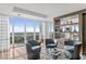Cozy seating area with floor to ceiling windows and open shelving at 3301 Bayshore Blvd # 2401E, Tampa, FL 33629