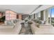 Expansive living room featuring city views, a bar and lounge area, and ample seating at 3301 Bayshore Blvd # 2401E, Tampa, FL 33629