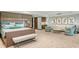 Luxurious main bedroom with a sitting area, wet bar, and ample space for relaxation at 3301 Bayshore Blvd # 2401E, Tampa, FL 33629