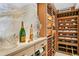 Beautiful custom wine cellar featuring extensive storage and display shelves at 3301 Bayshore Blvd # 2401E, Tampa, FL 33629