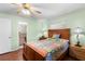 Charming bedroom with wood floors that connects to an ensuite bathroom at 3545 97Th N Ave # 4, Pinellas Park, FL 33782