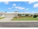 Charming single-story home with a well-manicured lawn and vibrant green shutters at 3545 97Th N Ave # 4, Pinellas Park, FL 33782