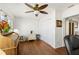 Cozy home office with wood floors, a ceiling fan, and bright natural light at 3545 97Th N Ave # 4, Pinellas Park, FL 33782