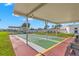 Outdoor shuffleboard area featuring multiple lanes and a covered shelter at 3545 97Th N Ave # 4, Pinellas Park, FL 33782
