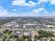 Vast aerial shot of the home's location, highlighting its proximity to highways and business districts at 3910 W Comanche Ave, Tampa, FL 33614