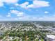 Expansive aerial view of the area, showing the home's location within a residential neighborhood at 3910 W Comanche Ave, Tampa, FL 33614