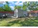 Spacious backyard featuring a storage container at 3910 W Comanche Ave, Tampa, FL 33614