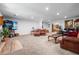 Spacious living room with plush seating, recessed lighting, and ample space for entertaining guests at 3910 W Comanche Ave, Tampa, FL 33614