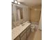 Bathroom featuring dual sinks and a shower and bath tub at 400 64Th Ave # 202, St Pete Beach, FL 33706