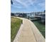 Waterfront condo docks and boat slips with multiple boats in the water at 400 64Th Ave # 202, St Pete Beach, FL 33706