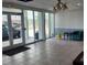 Bright lobby area with large windows and tiled floor at 400 64Th Ave # 202, St Pete Beach, FL 33706