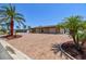 Inviting one-story home with a paver driveway, picturesque landscaping, and a two-car garage at 4011 99Th W St, Bradenton, FL 34210