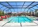 The beautiful pool area has a spa, swim up bar seating, and lots of space to lounge and enjoy the Florida sunshine at 4011 99Th W St, Bradenton, FL 34210