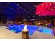 A stunning screened-in pool and spa with underwater lighting and fire bowls, perfect for nighttime entertainment at 4011 99Th W St, Bradenton, FL 34210