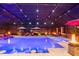 A stunning screened-in pool and spa with underwater lighting and fire bowls, perfect for nighttime entertainment at 4011 99Th W St, Bradenton, FL 34210