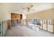 Spacious living room view shows fireplace and bathtub at 4144 Hampton Dr # C, New Port Richey, FL 34652