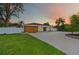 Beautiful single-story home with modern wood accents under an evening sky at 4500 22Nd N Ave, St Petersburg, FL 33713