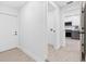 Hallway leads to mudroom with laundry adjacent to the kitchen at 4500 22Nd N Ave, St Petersburg, FL 33713