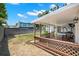 The home features a partially covered patio with wood decking and a privacy fence at 4519 S Grady Ave, Tampa, FL 33611