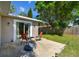 Backyard with a patio and a cozy seating area at 503 Tangerine Dr, Oldsmar, FL 34677