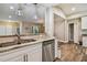 Lovely kitchen featuring granite countertops and stainless steel dishwasher at 503 Tangerine Dr, Oldsmar, FL 34677