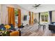 Spacious living room featuring contemporary wood floors and stylish modern decor at 503 Tangerine Dr, Oldsmar, FL 34677
