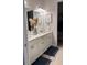 Elegant bathroom showcasing a double vanity with ample counter space and decorative accents at 5406 Rushmere Ct, Palmetto, FL 34221