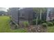 This home has a screened patio that provides an unobstructed view of the lush green backyard at 5406 Rushmere Ct, Palmetto, FL 34221