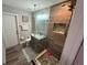 Modern bathroom with a glass shower, neutral tile, and updated vanity at 5554 Riva Ridge Dr, Wesley Chapel, FL 33544