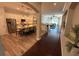 Open concept kitchen with stainless steel appliances, granite island, and easy access to the living area at 5554 Riva Ridge Dr, Wesley Chapel, FL 33544